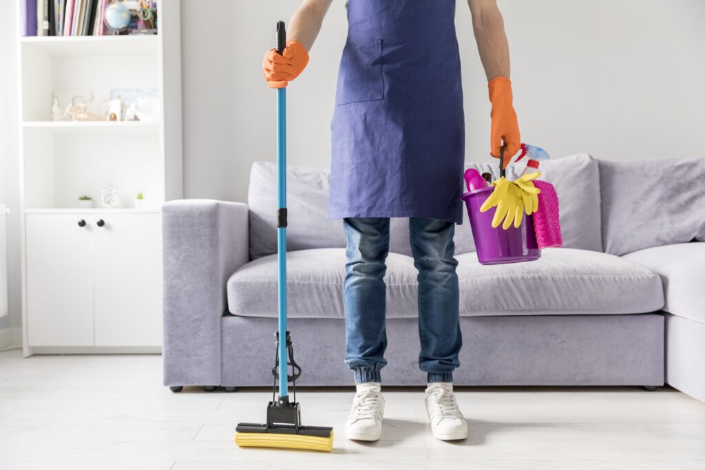 man-cleaning-his-home-min